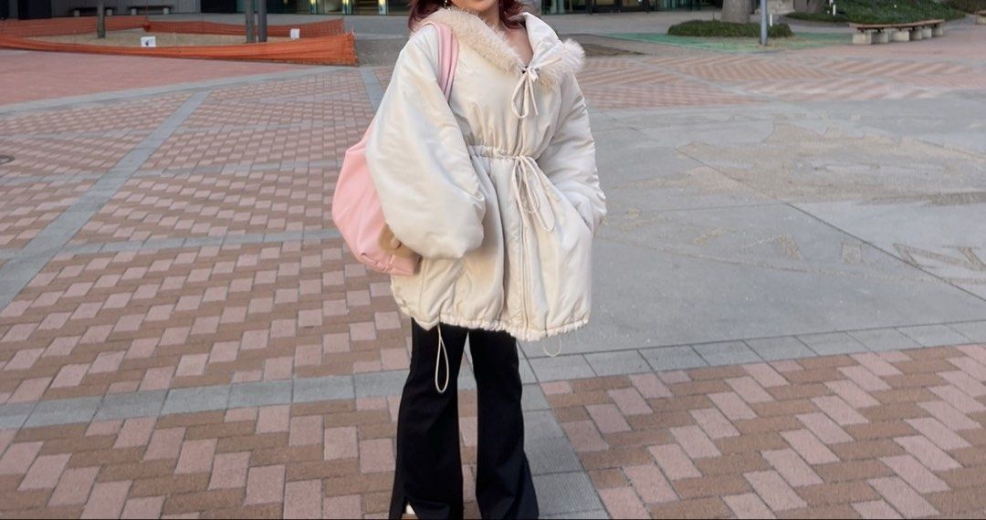 Cream Puffer Jacket with Fur Hood (Category: Coats, Jackets and Outerwear) located in Lipa City. Submitted by chiechums (Listing ID 1459340118, Image 1). Description: - Cream colored puffer jacket from One Way - Drawstring waist and hem for adjustable fit - Hood with soft faux fur trim - Zipper closure with button detail - Perfect for staying warm and stylish.