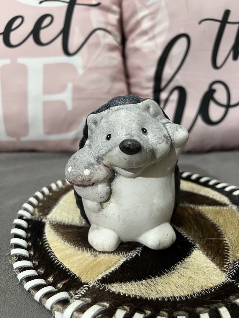 Cute Ceramic Hedgehog Figurine Holding Mushroom (Category: Other Home Decor) located in Las Pinas. Submitted by maple0305 (Listing ID 1459463907, Image 1). Description: - Adorable ceramic hedgehog figurine - Holding a cute mushroom - Perfect for shelf or desk decoration - Adds a charming touch to any space - Approximately 4 inches in height - No chips or cracks observed.