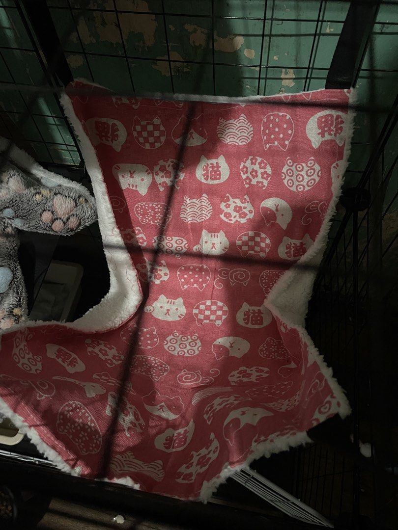 Cute Pink Cat Print Pet Hammock for Cage (Category: Homes & Other Pet Accessories) located in Manila. Submitted by chixstick (Listing ID 1459416597, Image 1). Description: - Adorable pink hammock with a fun all-over cat print. - Features a soft, cozy white fuzzy trim. - Easily hangs inside a pet cage. - Ideal for small pets such as hamsters, ferrets, and sugar gliders. - Provides a comfortable spot for resting and playing. - Adds a playful and st