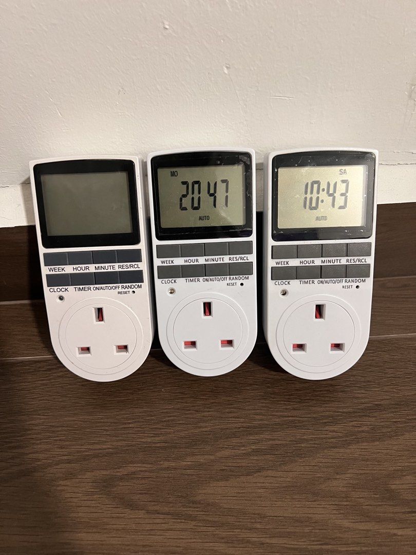 Digital Timer Plugs - Programmable Sockets (Category: Electrical, Adaptors & Sockets) located in Singapore. Submitted by pc_chua (Listing ID 1459459498, Image 1). Description: - Programmable digital timer plugs - Control appliances and save energy - All buttons and sockets are clean $7 each. $18 for three..