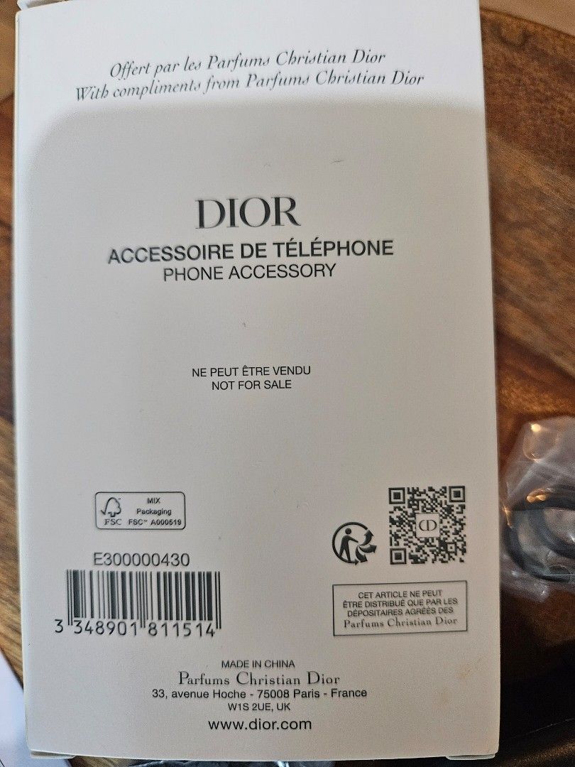 Dior Phone light (Category: Other Mobile & Gadget Accessories) located in Los Banos. Submitted by acleancloset (Listing ID 1459349212, Image 2). Description: - Authentic Dior phone accessory - Comes in original box with all packaging - Includes charging cable and clip attachment - Marked 'Not For Sale' - Ideal for any Dior collector.