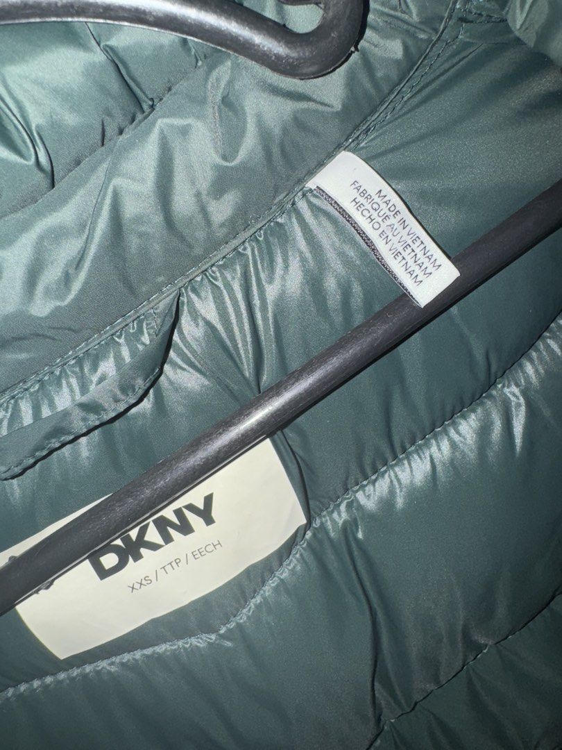 DKNY Green Puffer Jacket XXS (Category: Coats, Jackets and Outerwear) located in Quezon City. Submitted by furious0128 (Listing ID 1459489581, Image 3). Description: - Green DKNY puffer jacket - Features a hood for extra warmth - Full front zipper closure - Convenient side pockets - Made in Vietnam - Size XXS - Ideal for staying warm and stylish.