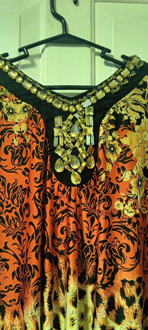 Embellished Kaftan Dress with Leopard Print (Category: Dresses) located in Paranaque City. Submitted by yesyesyo (Listing ID 1459379507, Image 1). Description: - Long, flowy kaftan dress - Unique bold print combining floral and leopard patterns - Neckline heavily embellished with beads and crystals - Ideal for parties or making a statement - Comfortable and stylish design this is not thrifted. all are for personal decluttering only. payment thru 