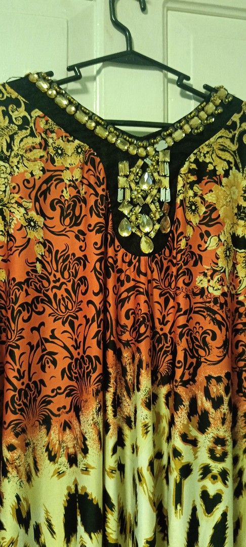 Embellished Kaftan Dress with Leopard Print (Category: Dresses) located in Paranaque City. Submitted by yesyesyo (Listing ID 1459379507, Image 3). Description: - Long, flowy kaftan dress - Unique bold print combining floral and leopard patterns - Neckline heavily embellished with beads and crystals - Ideal for parties or making a statement - Comfortable and stylish design this is not thrifted. all are for personal decluttering only. payment thru 