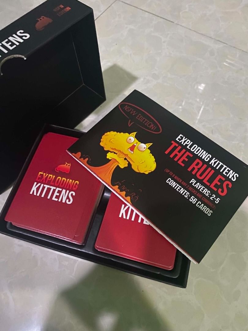 Exploding Kittens NSFW Deck Card Game (Category: Board Games & Puzzles) located in Angeles City. Submitted by rickki_t (Listing ID 1459466906, Image 1). Description: - Exploding Kittens NSFW Deck - A card game for adults (ages 30+) - Features kittens, explosions, boob wizards, and butts! - For 2-5 players - Playtime: 15 minutes - Includes 56 cards.