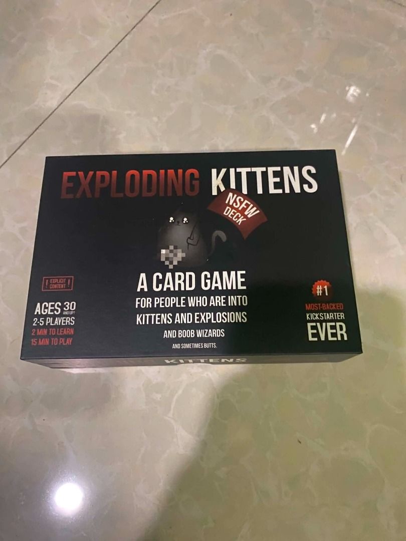 Exploding Kittens NSFW Deck Card Game (Category: Board Games & Puzzles) located in Angeles City. Submitted by rickki_t (Listing ID 1459466906, Image 2). Description: - Exploding Kittens NSFW Deck - A card game for adults (ages 30+) - Features kittens, explosions, boob wizards, and butts! - For 2-5 players - Playtime: 15 minutes - Includes 56 cards.