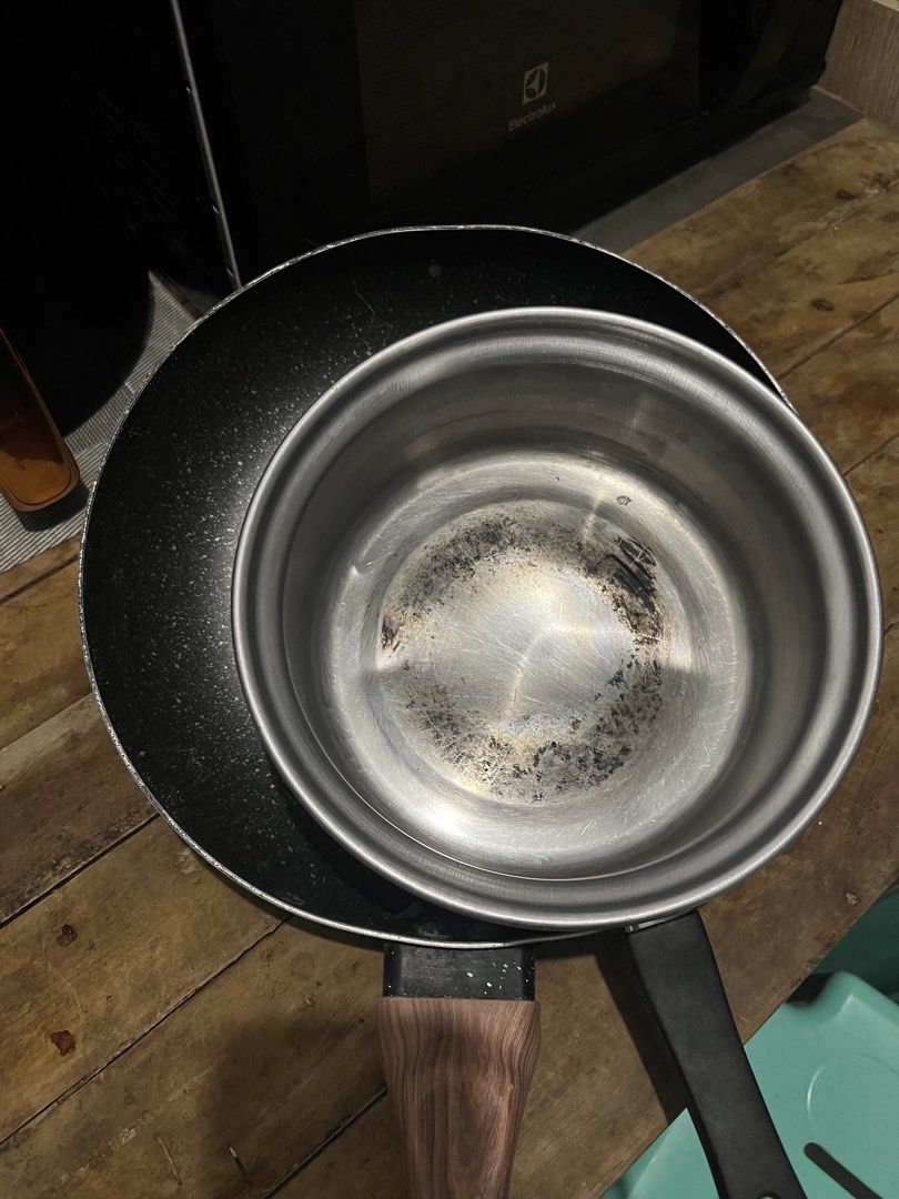 Frying Pan and Pot Set (Category: Cookware & Accessories) located in Manila. Submitted by cartmarj (Listing ID 1459396558, Image 3). Description: - Set includes frying pan and pot - Signs of use on pot interior and pan exterior bottom - Fully functional for everyday cooking - Just needs Cleaning .