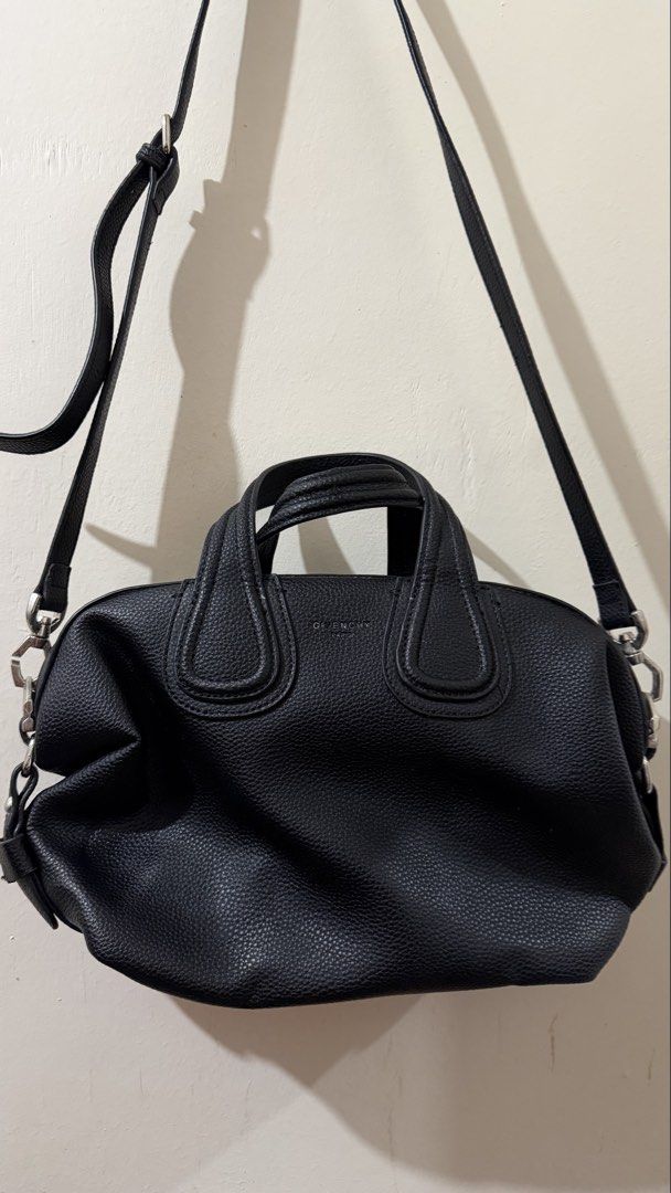 Givenchy Black Leather Crossbody Bag (Category: Cross-body Bags) located in Rizal. Submitted by lovegclothingph (Listing ID 1459410775, Image 2). Description: - Givenchy Antigona Lock shoulder bag - Color: Black - Material: Leather - Design: Antigona Lock - Features: Top handles and detachable shoulder strap - Hardware: Silver-tone - Interior: Spacious, ideal for essentials - Versatile: Suitable for daily use and evening events - With minimal sig