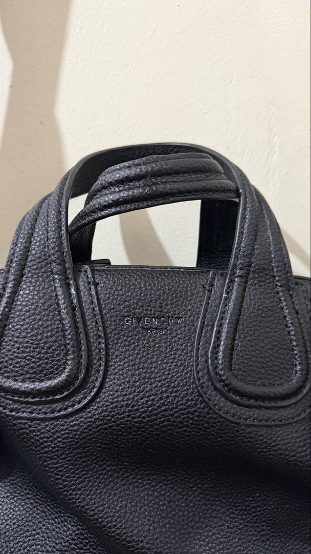Givenchy Black Leather Crossbody Bag (Category: Cross-body Bags) located in Rizal. Submitted by lovegclothingph (Listing ID 1459410775, Image 3). Description: - Givenchy Antigona Lock shoulder bag - Color: Black - Material: Leather - Design: Antigona Lock - Features: Top handles and detachable shoulder strap - Hardware: Silver-tone - Interior: Spacious, ideal for essentials - Versatile: Suitable for daily use and evening events - With minimal sig