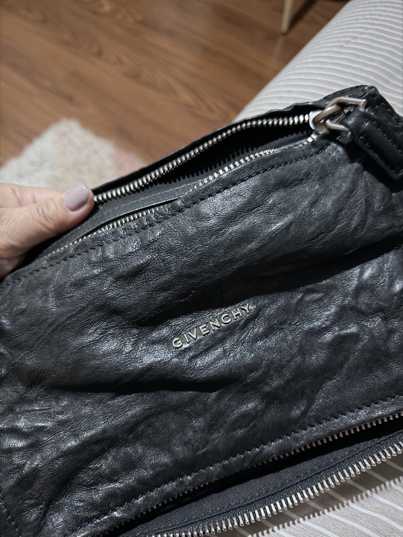 Givenchy Black Leather Pandora Bag (Category: Luxury Bags & Wallets) located in Rizal. Submitted by nhacio06 (Listing ID 1459405533, Image 3). Description: - Authentic Givenchy Pandora Bag - Color: Black - Material: Sheepskin Leather - Origin: Made in Italy - Features: Top handle, zip closure - Interior: Spacious, great for everyday essentials Slightly negotiable Guaranteed authentic Rfs: decluttering .