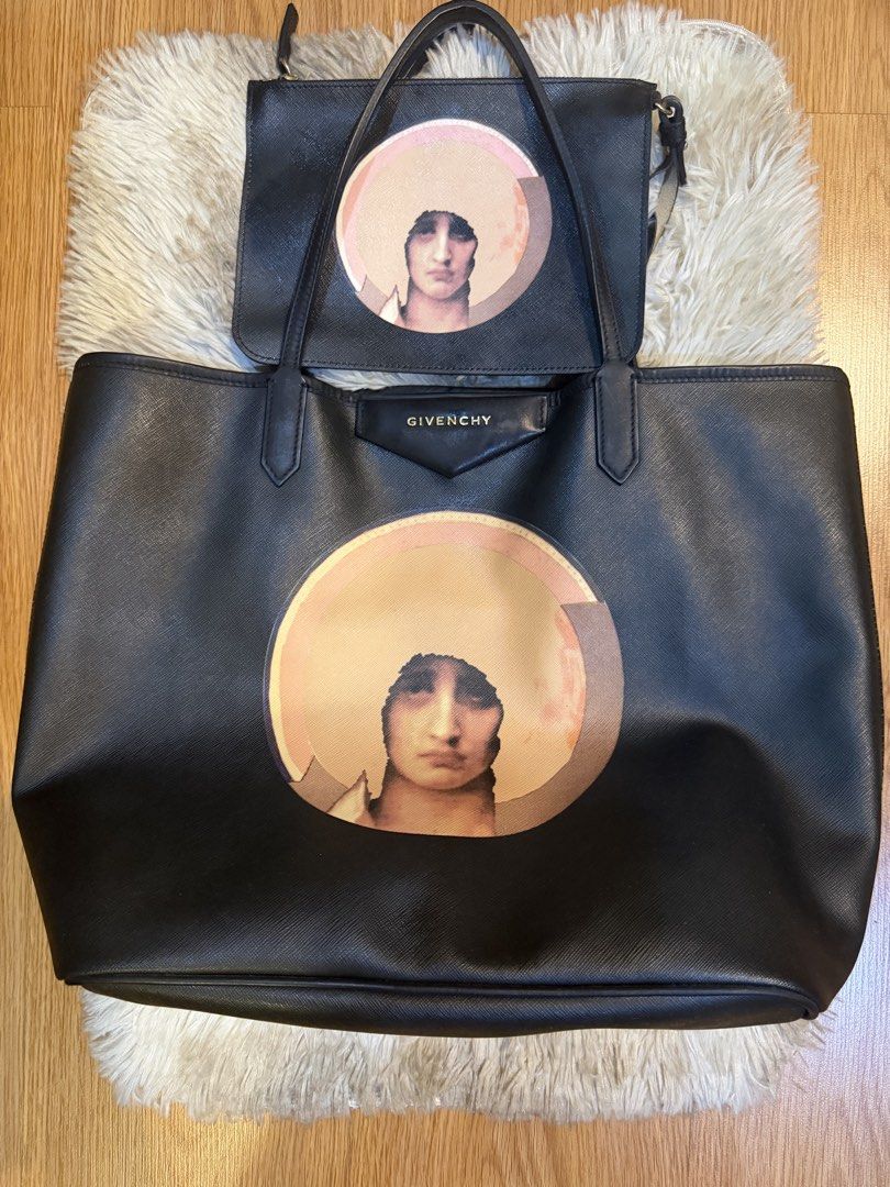 Givenchy Black Tote Bag with Printed Face Design (Category: Tote Bags) located in Manila. Submitted by hairaen (Listing ID 1459329323, Image 1). Description: - Authentic Givenchy black tote bag - Features a striking face graphic print on the front - Includes a convenient matching smaller pouch - Expertly crafted in Italy - Ideal for everyday style and practicality.