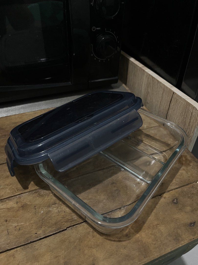 Glass Food Container with Lid (Category: Food Organization & Storage) located in Manila. Submitted by cartmarj (Listing ID 1459396835, Image 1). Description: Square glass food container with divider and dark blue lid. Microwave safe, easy to clean. Perfect for meal prep and leftovers. Leak-proof!!.