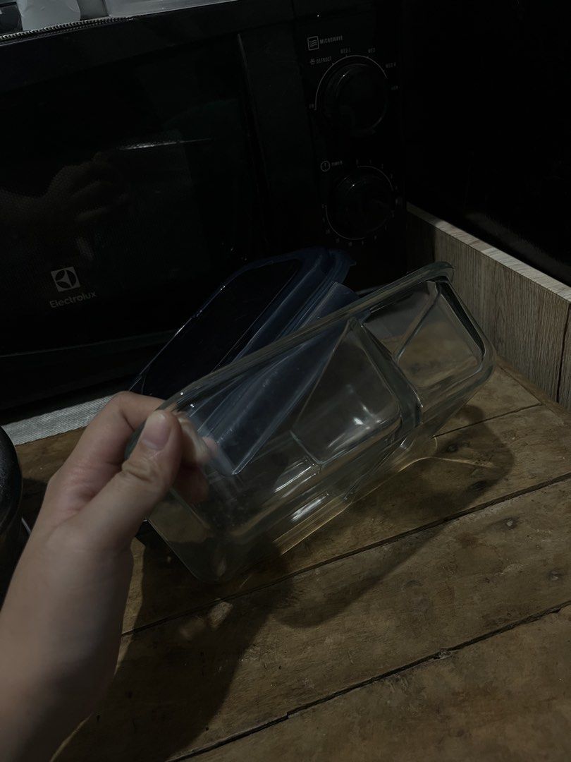 Glass Food Container with Lid (Category: Food Organization & Storage) located in Manila. Submitted by cartmarj (Listing ID 1459396835, Image 2). Description: Square glass food container with divider and dark blue lid. Microwave safe, easy to clean. Perfect for meal prep and leftovers. Leak-proof!!.