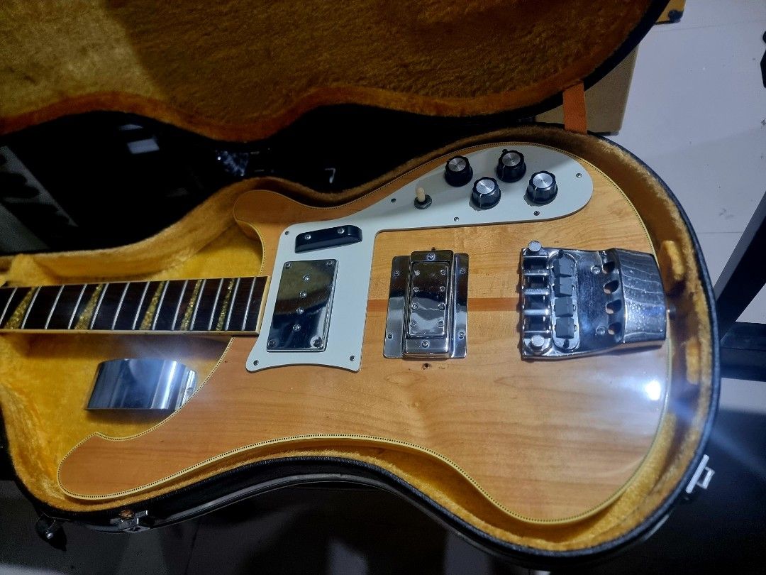 Greco rb1000 bass with Hard Case (Category: Musical Instruments) located in Binan City. Submitted by jamrock.music (Listing ID 1459442029, Image 2). Description: - Vintage Greco rickenbacker bass - Natural wood finish - Unique fret inlays - Comes with a hard case - Yellow velvet lining inside the case - Ideal for collectors and musicians.