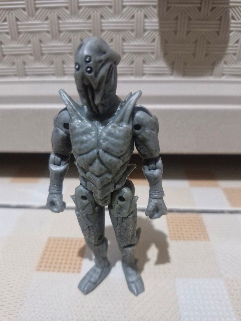Grey Alien Insectoid Action Figure Toy (Category: Figurines & Statues) located in Bacolod City. Submitted by racielle (Listing ID 1459379785, Image 1). Description: - Unique grey alien-inspired action figure - Features a segmented body and multiple eyes - Fully articulated limbs for dynamic posing - Constructed from durable hard plastic - Ideal for collectors and display enthusiasts.