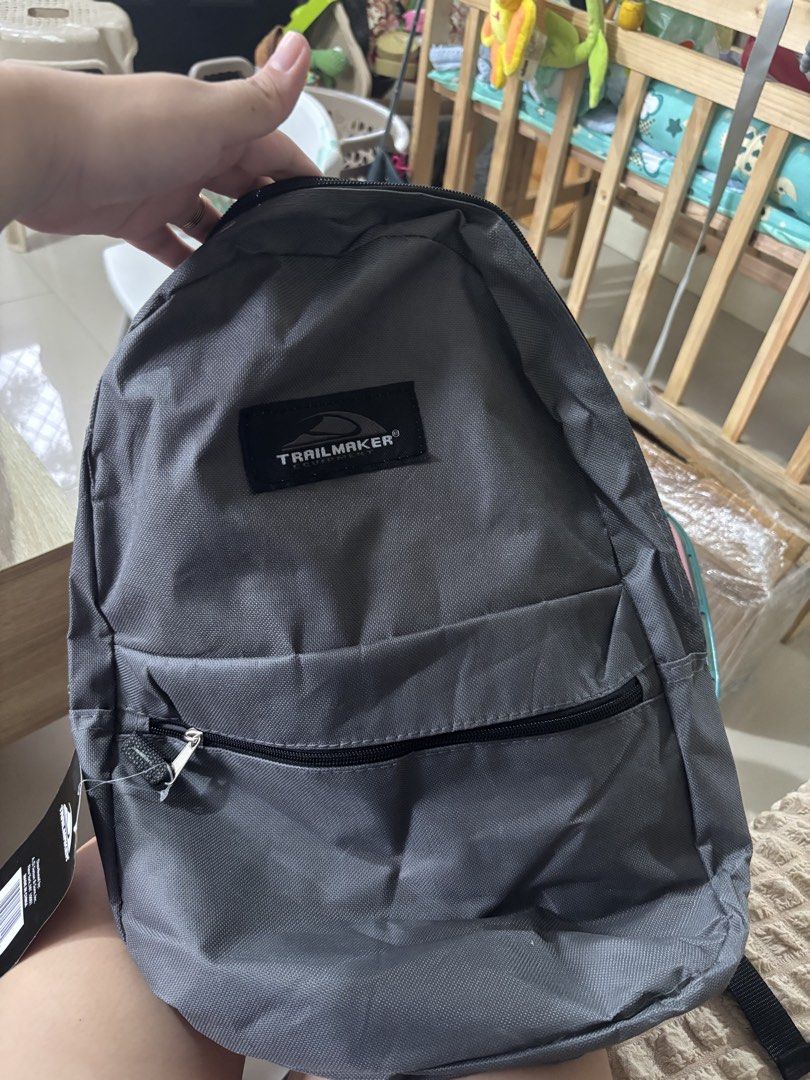 Grey Backpack (Category: Backpacks) located in Calauan. Submitted by amaris.boutique.ph (Listing ID 1459365686, Image 1). Description: - Simple grey backpack - Adjustable straps for a comfortable fit - Main compartment with secure zip closure - Ideal for everyday use or school - Lightweight and easy to carry.
