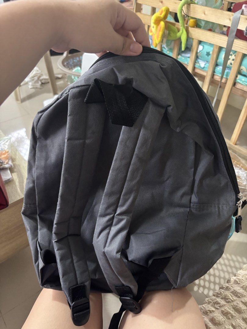 Grey Backpack (Category: Backpacks) located in Calauan. Submitted by amaris.boutique.ph (Listing ID 1459365686, Image 2). Description: - Simple grey backpack - Adjustable straps for a comfortable fit - Main compartment with secure zip closure - Ideal for everyday use or school - Lightweight and easy to carry.