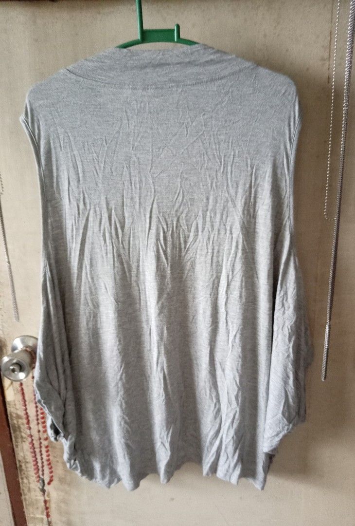 Grey Sleeveless Zip-Up Vest with Pockets (Category: Coats, Jackets and Outerwear) located in Quezon City. Submitted by chacha30.s (Listing ID 1459362418, Image 2). Description: - Grey sleeveless vest - Zip-up front closure - Two front pockets with black trim - Soft and flowy material - Ideal for layering over tops - Easy to wear and style - Comfortable for casual outings . Text me at 09277152134 . Buy na po kayo/Offer lang po kayooo. . Bili na po