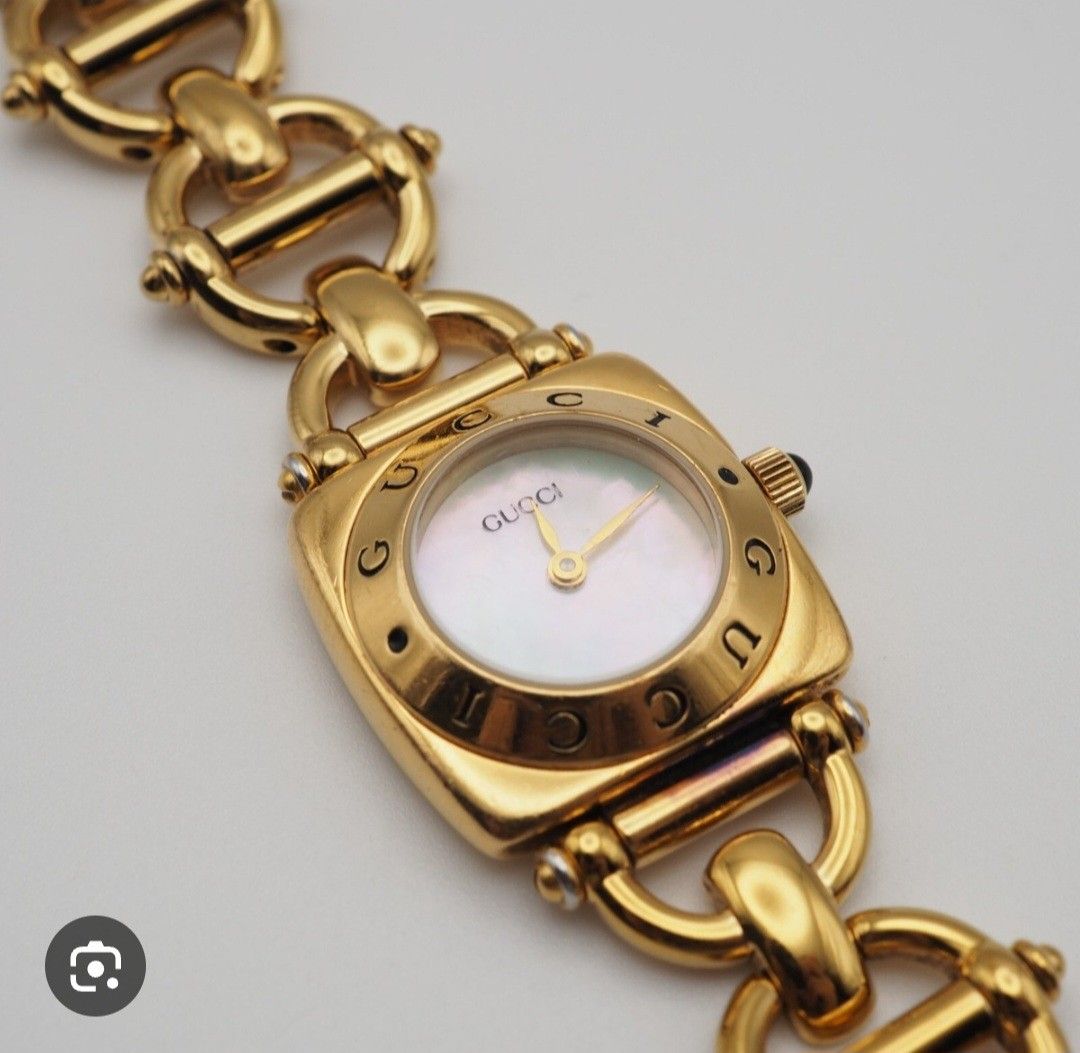 Gucci 18k Gold Plated Watch (Category: Women's Watches) located in Mandaluyong City. Submitted by cess_badinas (Listing ID 1459294448, Image 3). Description: - Vintage Gucci 6400L watch - Year 1990 Model - Gold plated with mother of pearl face - Iconic Gucci horsebit link bracelet - White dial with gold hands and markers - Swiss made movement - In good working condition - A timeless collector's piece Hard Pass sa TAWAD. posted price is my Last Pr