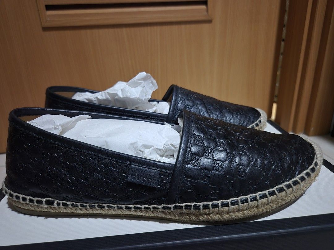 Gucci Black Leather GG Embossed Espadrilles (Category: Flats & Sandals) located in Quezon City. Submitted by dpj--- (Listing ID 1459422336, Image 2). Description: - Authentic Gucci black leather espadrilles - Iconic GG embossed pattern all over - Jute sole detail - Includes dust bags and box - Ideal for casual wear *Slightly negotiable .