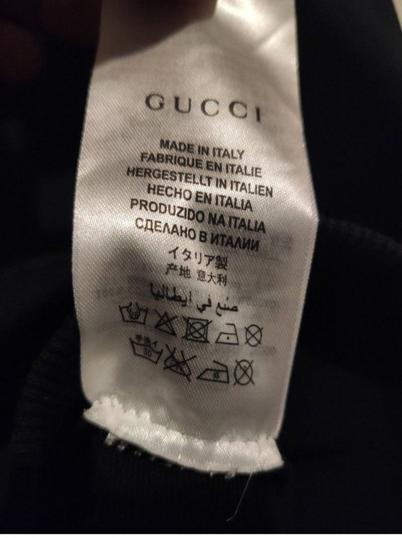 Gucci Black Sheep Print Sweatshirt (Category: Coats, Jackets and Outerwear) located in Paranaque City. Submitted by daddyu (Listing ID 1459354766, Image 2). Description: - Authentic Gucci sweatshirt - Size Large - Iconic sheep print - Made in Italy - Crew neck, long sleeves - Ideal for casual wear - Stylish and comfortable.