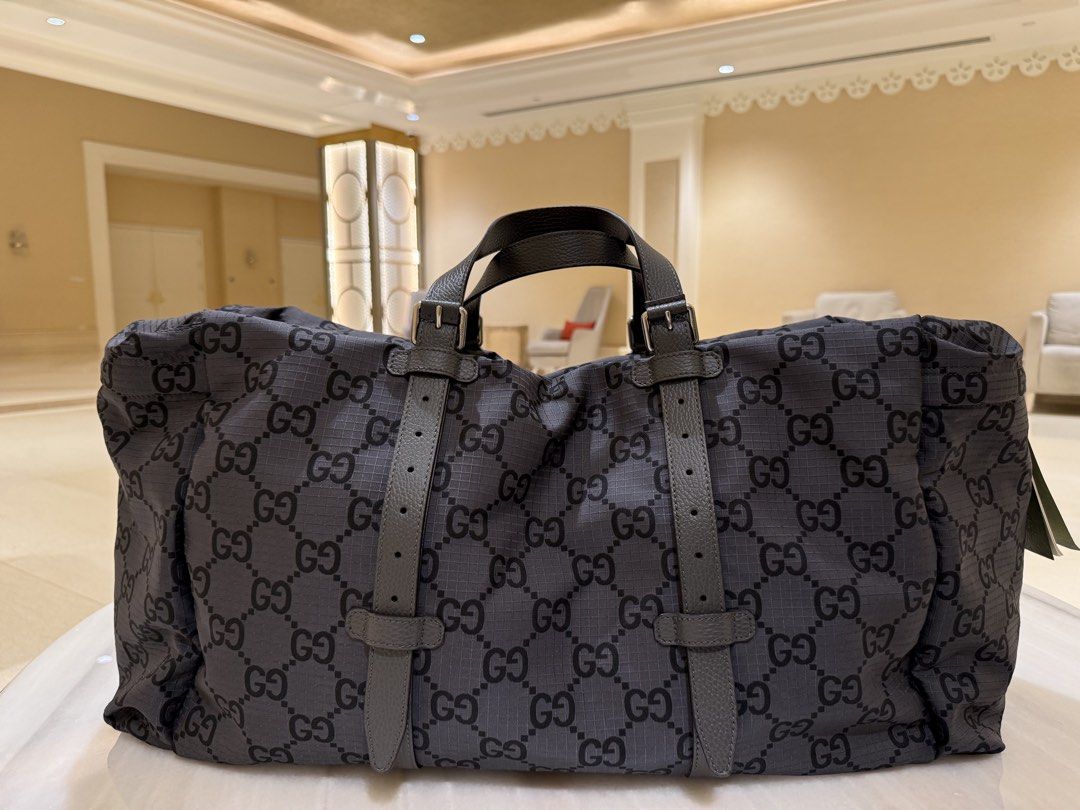 Gucci Maxi GG Duffle Bag (Category: Luxury Bags & Wallets) located in Angeles City. Submitted by tayaggem (Listing ID 1459443890, Image 3). Description: GUCCI MAXI GG DUFFLE BAG BRAND NEW • AUTHENTIC • BOUGHT IN DUBAI 🇦🇪 Details: • Brand new / unused • Authentic Gucci • Purchased in Dubai 🇦🇪 • Comes with Gucci dust bag • Spacious duffle design • Classic Maxi GG canvas with leather details • Ready for its new owner 🤎 📍 Location: Pampanga & M