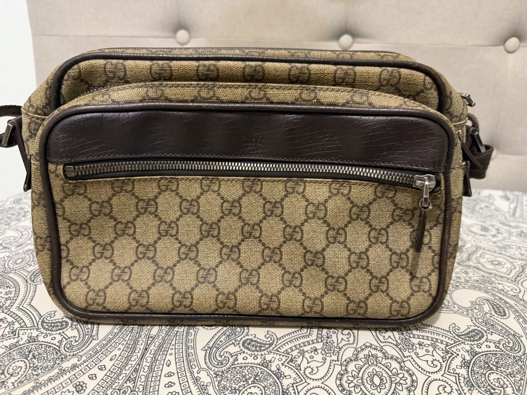Gucci Monogram Crossbody Bag (Category: Luxury Bags & Wallets) located in Muntinlupa City. Submitted by skapdesign (Listing ID 1459305397, Image 1). Description: - Authentic Gucci crossbody bag - Classic GG monogram canvas - Brown leather trim - Main compartment zip closure - Front zip pocket - Adjustable strap for comfortable wear - Great for everyday use.