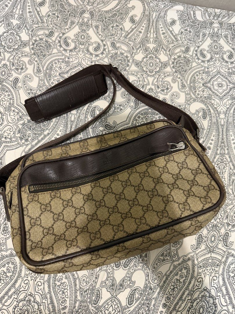 Gucci Monogram Crossbody Bag (Category: Luxury Bags & Wallets) located in Muntinlupa City. Submitted by skapdesign (Listing ID 1459305397, Image 2). Description: - Authentic Gucci crossbody bag - Classic GG monogram canvas - Brown leather trim - Main compartment zip closure - Front zip pocket - Adjustable strap for comfortable wear - Great for everyday use.