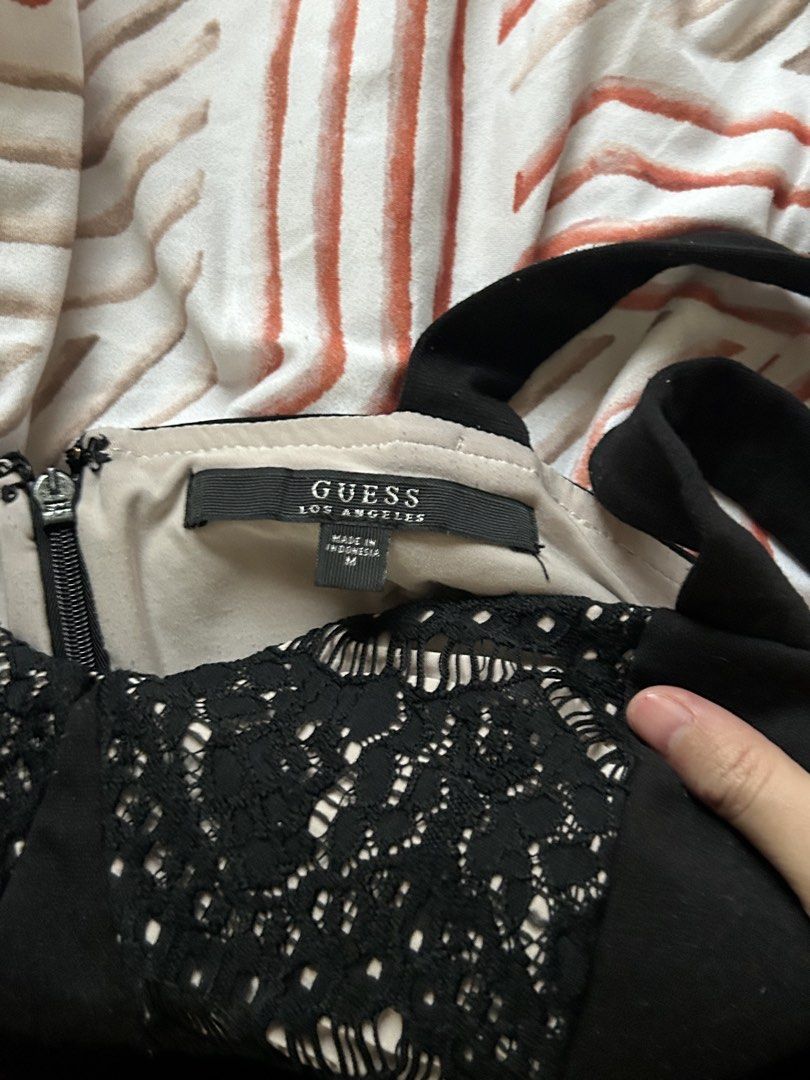 Guess Black Lace Peplum Top Size M (Category: Sleeveless) located in Pasig City. Submitted by ThePrelovedShop (Listing ID 1459490929, Image 2). Description: - Black Guess peplum top - Features delicate lace details - Sweetheart neckline - Zipper closure at the back - Size: Medium on tag Cainta Rizal.