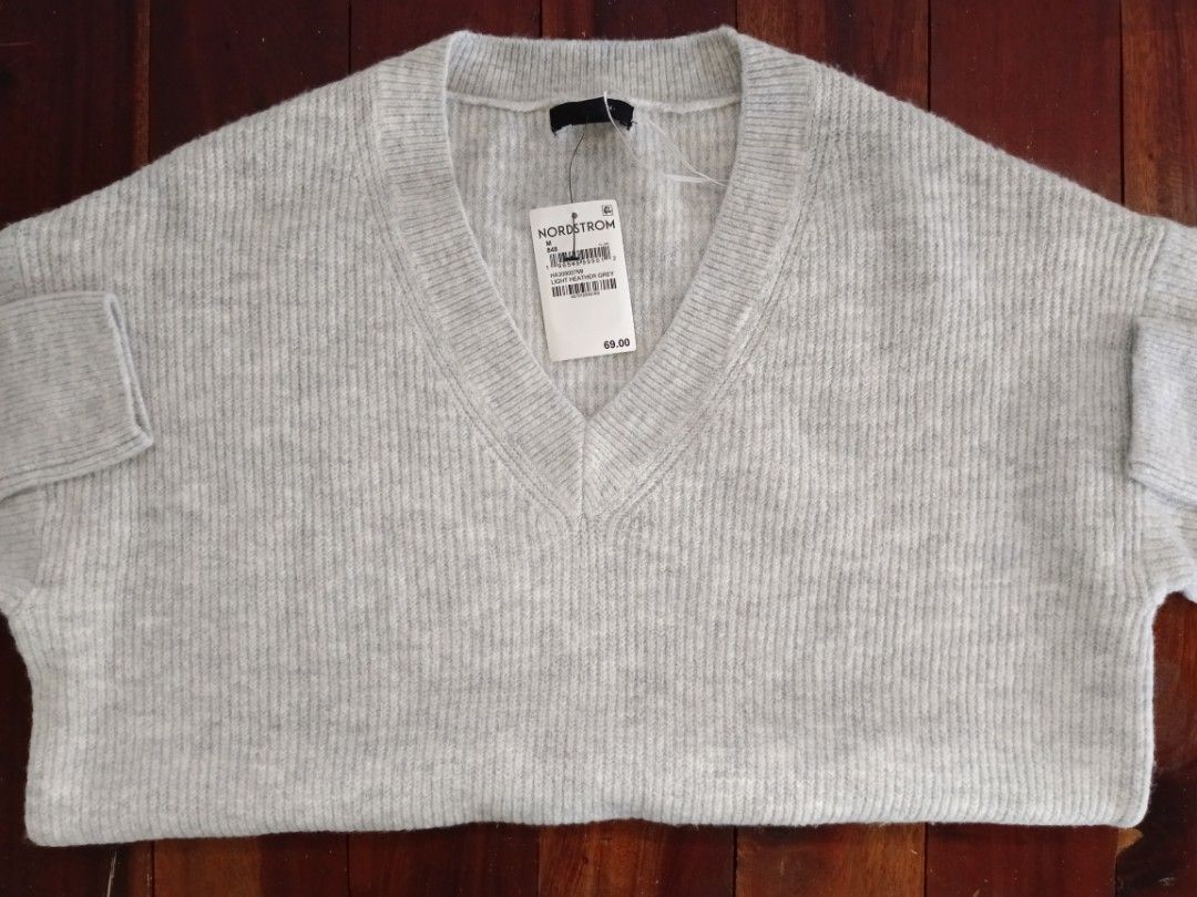Halogen V-Neck Ribbed Knit Sweater - Light Grey (Category: Coats, Jackets and Outerwear) located in Manila. Submitted by janeneb (Listing ID 1459369215, Image 2). Description: - Brand: Nordstrom - Color: Light Grey - Neckline: V-neck - Texture: Ribbed knit - Size: Medium (tag attached, original price $69.00), US size - Material: Soft and comfortable - Style: Great for layering or wearing alone - Last price.