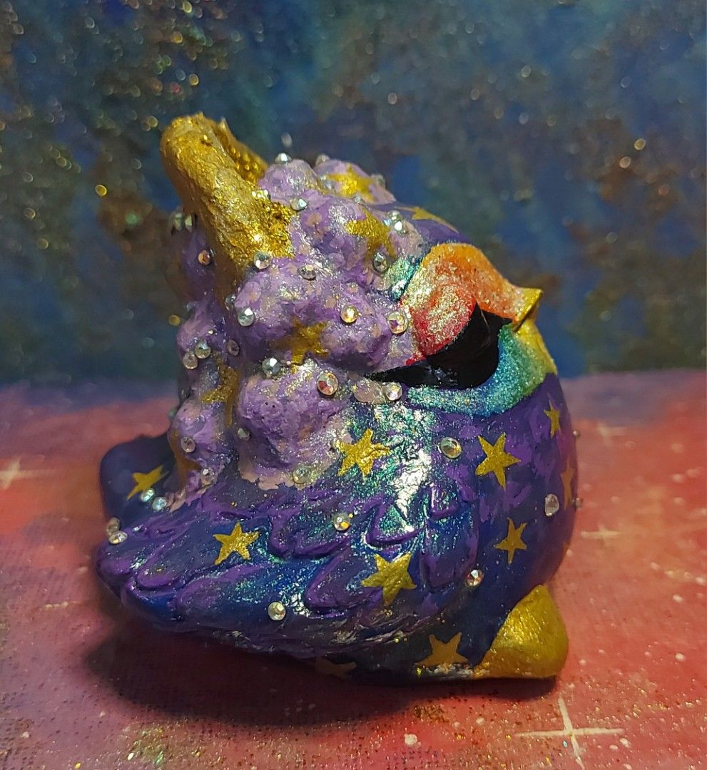 Hand Made Figurine Little Bird (Category: Designer & Blind Box Toys) located in Manila. Submitted by veiledcelestial (Listing ID 1459294185, Image 1). Description: 🌈☁️✨️From my Rainbow and Clouds Series✨️☁️🌈 Still, they are made out of the same source of clouds, sparkles, rainbows, stardust, and everything nice Year: 2026 Medium: Hand-made toy figurines made from plaster of parish, terra cotta, painted with acrylic paint with glitters, crystals