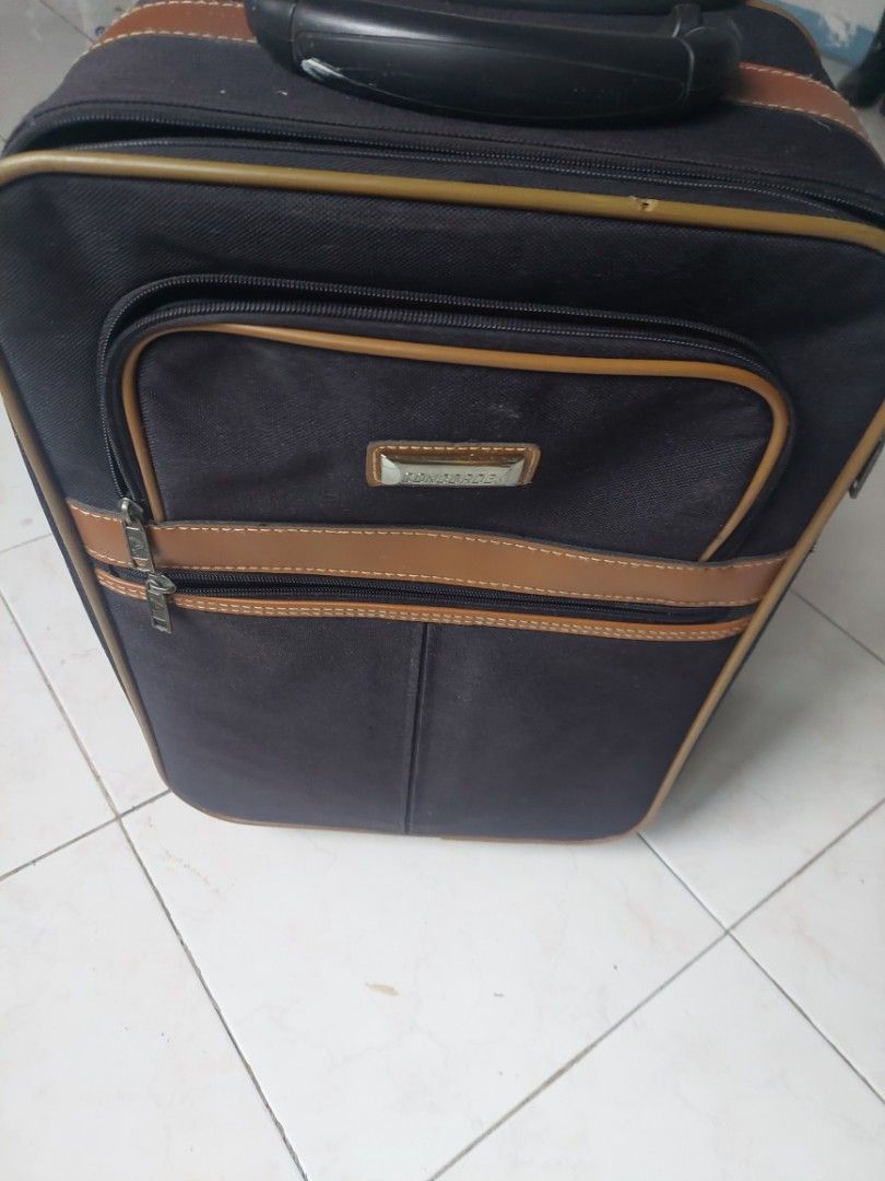 Handy Luggage (Category: Luggage) located in Cainta. Submitted by ceejay.lim (Listing ID 1459325469, Image 1). Description: - Stylish black and brown handy luggage for storage or travel - pls see photos carefully -design handle as is - L - 43cm W - 32cm Handle to wheels - 33cm.