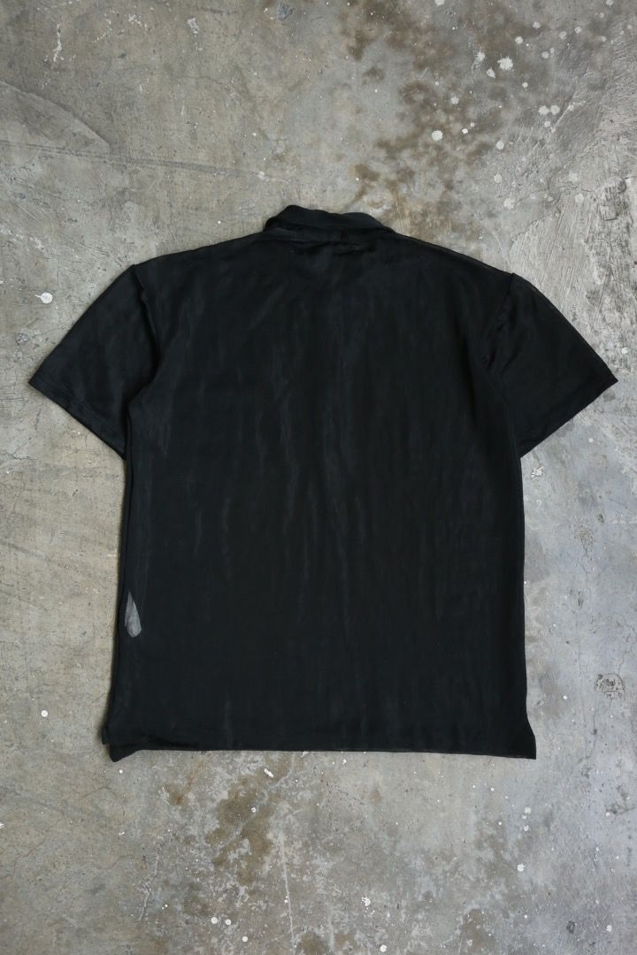 Helmut Lang - S/S 93 - Sheer Polo (Category: Tshirts & Polo Shirts ) located in Manila. Submitted by graymatter_ (Listing ID 1459418531, Image 2). Description: Helmut Lang - S/S 93 - Sheer Polo Tagged Size: S Condition: 8.5/10 Flaws: Overall Minor Runs Material: 100% Nylon Made in: Italy Dimensions Length: 26.5 Width: 19.5 Shoulder: 17.5 Sleeve: 7.