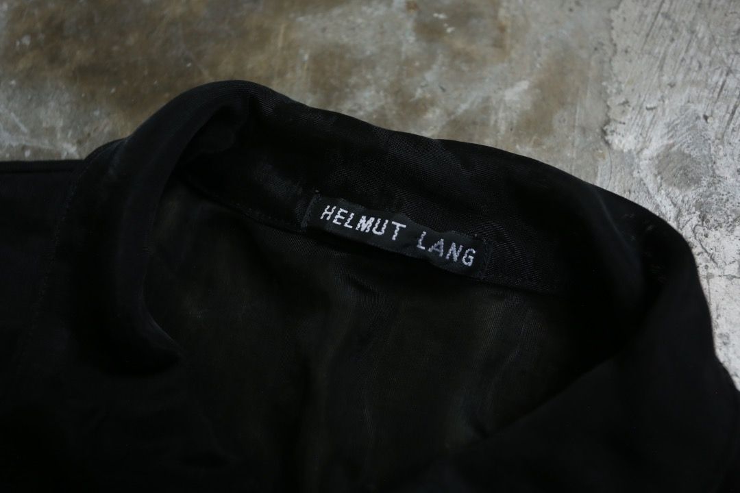 Helmut Lang - S/S 93 - Sheer Polo (Category: Tshirts & Polo Shirts ) located in Manila. Submitted by graymatter_ (Listing ID 1459418531, Image 3). Description: Helmut Lang - S/S 93 - Sheer Polo Tagged Size: S Condition: 8.5/10 Flaws: Overall Minor Runs Material: 100% Nylon Made in: Italy Dimensions Length: 26.5 Width: 19.5 Shoulder: 17.5 Sleeve: 7.
