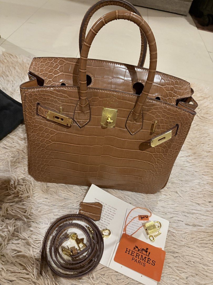 Hermes Birkin Crocodile Embossed Leather Handbag (Category: Luxury Bags & Wallets) located in Caloocan City. Submitted by fierce_mica29 (Listing ID 1459455423, Image 1). Description: - brown crocodile embossed leather handbag - Elegant gold hardware details - Includes detachable shoulder strap - Comes with lock and keys - cards included - made in France.