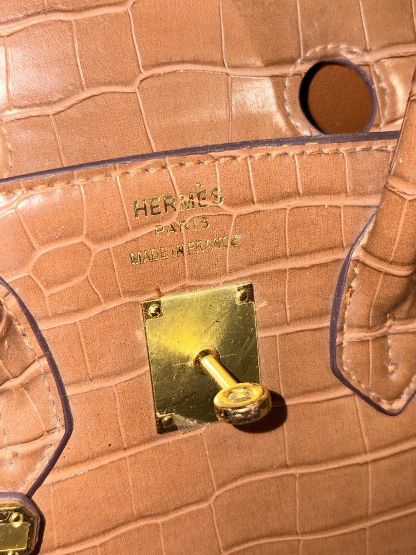 Hermes Birkin Crocodile Embossed Leather Handbag (Category: Luxury Bags & Wallets) located in Caloocan City. Submitted by fierce_mica29 (Listing ID 1459455423, Image 3). Description: - brown crocodile embossed leather handbag - Elegant gold hardware details - Includes detachable shoulder strap - Comes with lock and keys - cards included - made in France.
