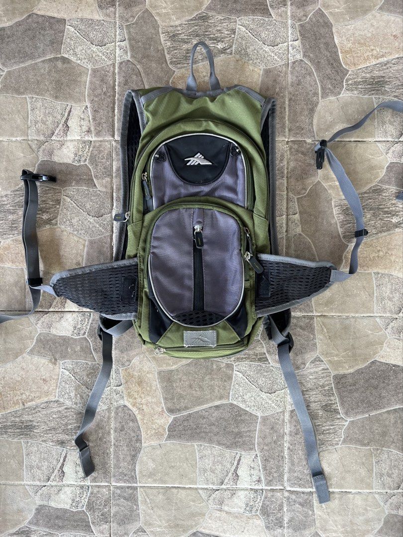 High Sierra multi compartment backpack (Category: Backpacks) located in Tagbilaran City. Submitted by muffintime96 (Listing ID 1459355038, Image 1). Description: - Olive green and grey High Sierra backpack - Perfect for hiking and day trips - Multiple compartments and pockets for organized storage - Padded shoulder straps and adjustable waist strap for maximum comfort - Zippers and straps are functional - Note: Minor signs of wear on zippers.