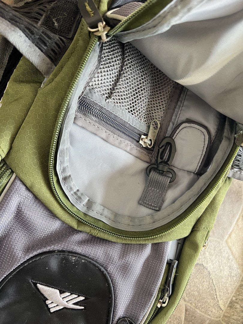 High Sierra multi compartment backpack (Category: Backpacks) located in Tagbilaran City. Submitted by muffintime96 (Listing ID 1459355038, Image 2). Description: - Olive green and grey High Sierra backpack - Perfect for hiking and day trips - Multiple compartments and pockets for organized storage - Padded shoulder straps and adjustable waist strap for maximum comfort - Zippers and straps are functional - Note: Minor signs of wear on zippers.