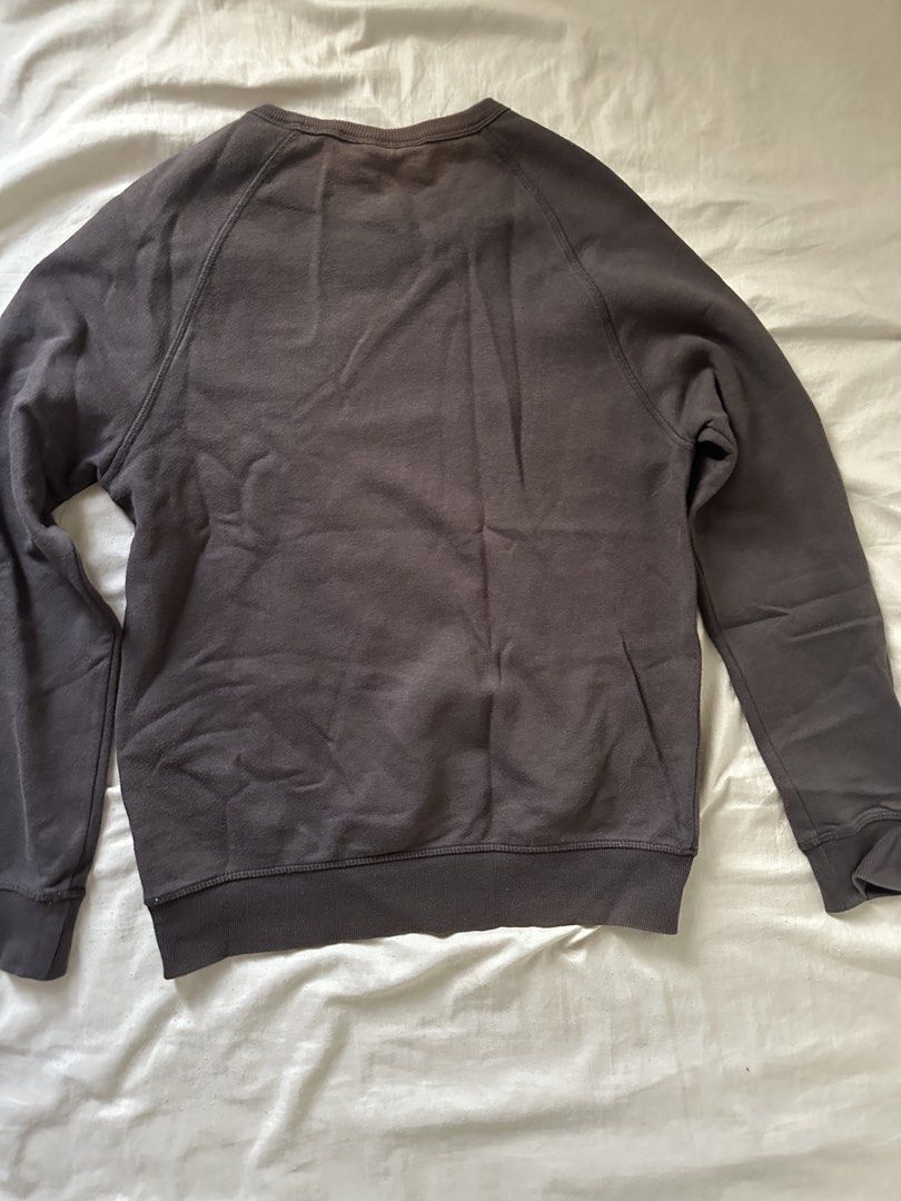 H&M Crewneck Sweatshirt Regular Fit - Dark Grey (Category: Coats, Jackets and Outerwear) located in Lipa City. Submitted by chiechums (Listing ID 1459340619, Image 3). Description: - Dark grey H&M crewneck sweatshirt - Size: EUR XS - Fit: Regular - Features: Raglan sleeves, ribbed cuffs and hem - Style: Comfortable and casual, perfect for layering or wearing solo.