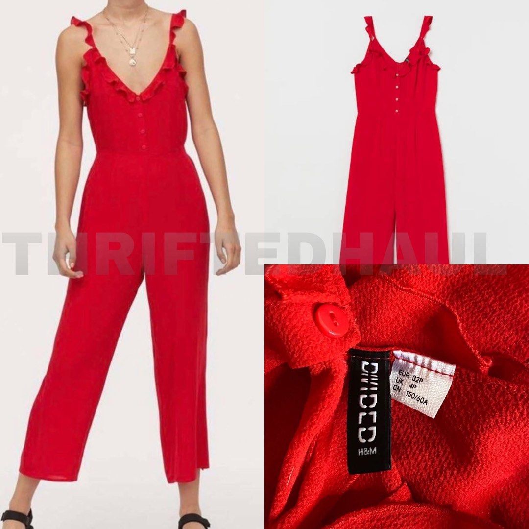 H&M Red Ruffled Strap Jumpsuit (Category: Jumpsuits) located in Binan City. Submitted by myprelovedhaul (Listing ID 1459337093, Image 3). Description: This is a red H&M jumpsuit featuring ruffled straps and decorative buttons down the front..