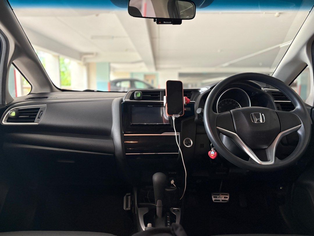 Honda Fit 1.3A Auto (Category: Used Cars) located in Singapore. Submitted by rainyph (Listing ID 1459299440, Image 2). Description: Low mileage car. Less driven as i am working from home. Excellent condition No consignment chats entertained from dealers. Dealers can only message if buying or have offer..