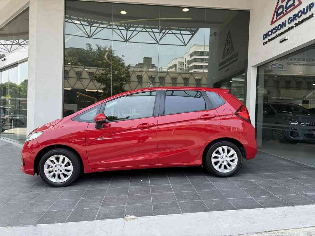 Honda Jazz 1.3 (A) (Category: Used Cars) located in Singapore. Submitted by dicksonauto (Listing ID 1459346461, Image 2). Description: 1 owner. Well maintained and well take care, must view to appreciate its pristine condition, we offer certified pre-owned cars with a warranty for worry free ownership. Our buy back scheme and end-to-end support help maintain your car's condition, ensuring a higher resale value. Enjoy 24/7 roadside assistance and 