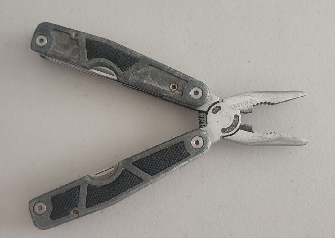 Husky Multi Tool 10-1 Leatherman Pliers (Category: Home Improvement Tools & Accessories) located in Manila. Submitted by dampotmnl (Listing ID 1459481687, Image 3). Description: - Husky Multi-tool - Stainless Steel Construction - Features: Pliers, Knife, Bottle Opener, Ruler - Compact and handy for various tasks - Perfect for your toolbox or emergency kit.