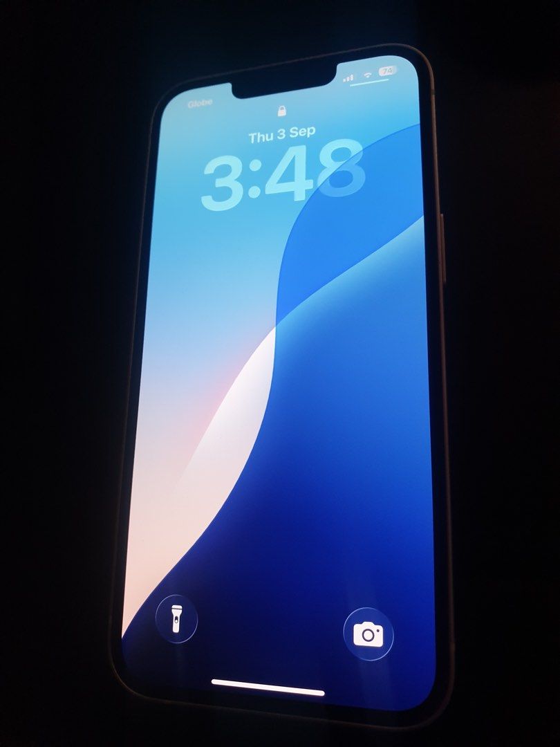 iPhone 13 (Category: iPhone 13 Series) located in Bulacan. Submitted by livetree_91bc04 (Listing ID 1459359838, Image 3). Description: 📱 PHONE CONDITION • Bought in UAE 🇦🇪 • Used for 1 year only • No issues • No dents • 86% Battery Health • Original battery • 128 GB storage • Never repaired or opened • Factory unlocked — Any SIM • Face ID & True Tone working perfectly • Smooth and reliable performance • Clean & well-maintained condition 📦 INC