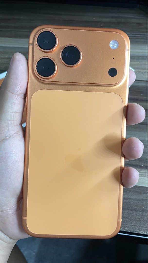 IPHONE 17 PRO MAX 512GB (Category: Cases & Sleeves) located in Caloocan City. Submitted by je343552436 (Listing ID 1459291922, Image 3). Description: Smart Lock - Model: iPhone 17 Pro Max - Storage: 512GB - Color: Orange - Condition: Excellent, like new - Battery Health: 100% Maximum Capacity - Cycle Count: 50 - Manufacture Date: November 2025 - First Use: March 2026 - Meetup Location: Plaridel, Bulacan.