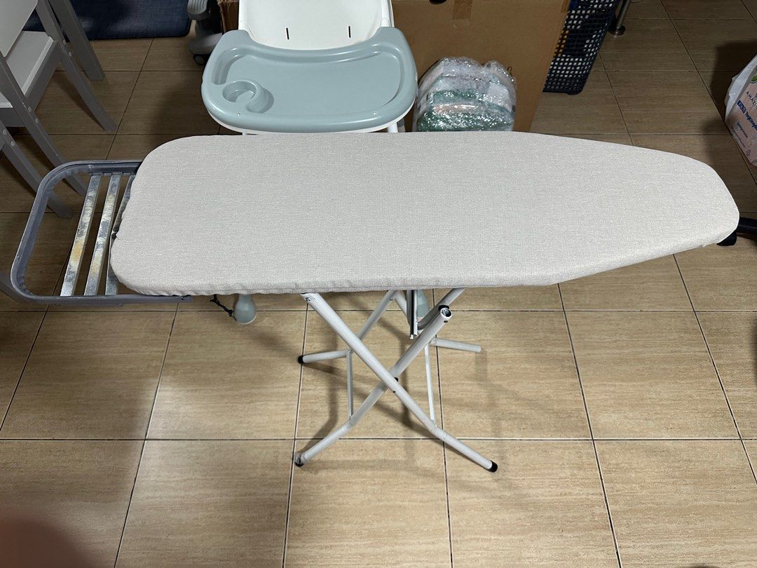 Ironing Board with Metal Frame (Category: Home Improvement Tools & Accessories) located in Quezon City. Submitted by sairylpali (Listing ID 1459464313, Image 1). Description: - Adjustable height for comfortable ironing - Sturdy metal frame - Light grey fabric cover - Folds flat for easy storage - Convenient side tray for accessories - Minor cosmetic marks on metal frame - Fully functional and ready to use.