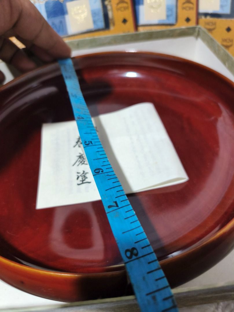 Japanese Lacquer Serving Plate with Box (Category: Dinnerware & Cutlery) located in San Leonardo. Submitted by burgossanleonardo.12345 (Listing ID 1459311764, Image 1). Description: - Beautiful dark red lacquer serving plate - Comes in its original box - Includes a small paper insert with Japanese writing - Measures approximately 8 inches in diameter - Ideal for serving snacks or as a decorative piece.
