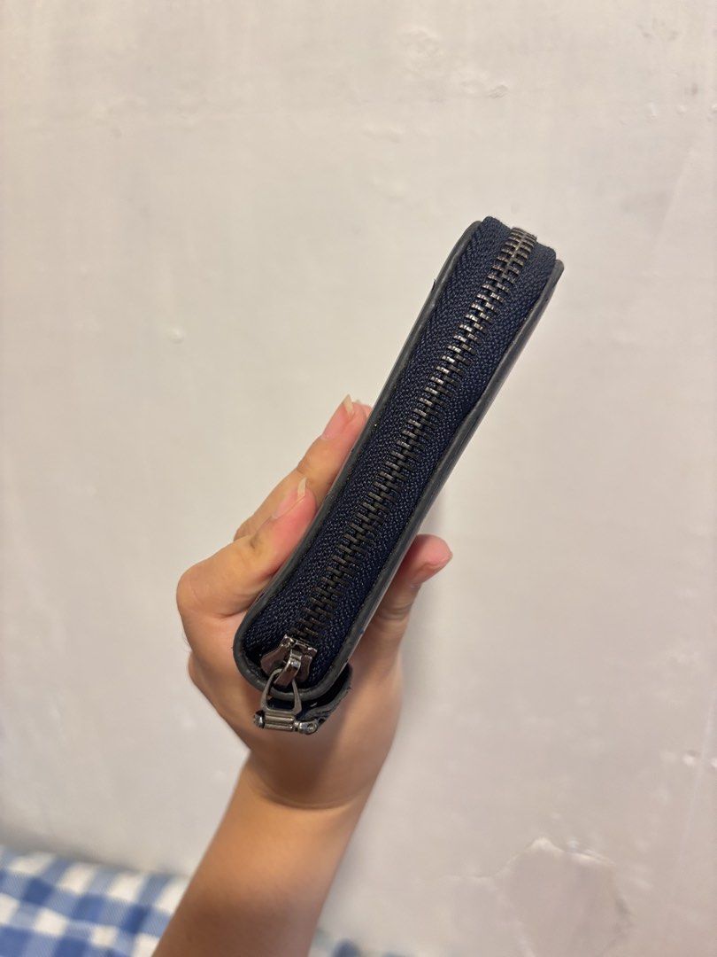 Jeep Buluo Navy Blue Zip Around Wallet (Category: Wallets & Card holders) located in Lapu Lapu. Submitted by affordmo (Listing ID 1459332637, Image 3). Description: - Navy blue Jeep Buluo wallet - Zip-around closure for security - Stylish stitched detail on the front - Generous interior space for cards and cash - Ideal for everyday use.