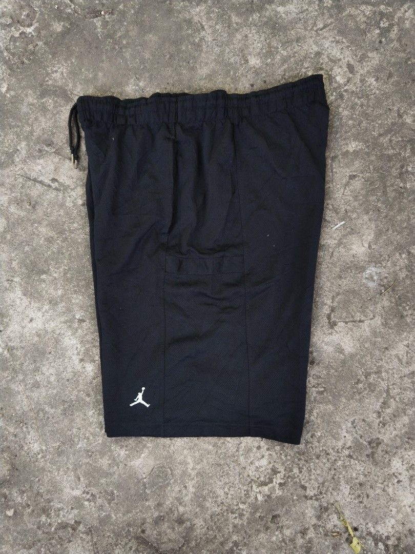 Jordan Bankroll Triple black V1 (Category: Shorts) located in Tabaco. Submitted by strain_finds (Listing ID 1459359454, Image 2). Description: - Black Jordan shorts with iconic Jumpman logo - Size Medium (M) - Comfortable elastic waistband with adjustable drawstring - Two convenient side pockets - Breathable mesh fabric - Ideal for athletic activities or everyday casual style.