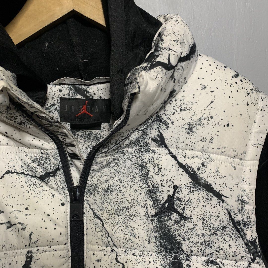Jordan Puffer Jacket White Black Crackle Print (Category: Coats, Jackets and Outerwear) located in Manila. Submitted by emplysthrift. (Listing ID 1459375300, Image 3). Description: - Cool Jordan puffer jacket - Unique white and black crackle print design - Black sleeves and hood - Zip-up front with pockets - Perfect for staying warm and stylish - A must-have for any Jordan fan Jordan Puffer Jacket White Black Crackle Print Width "20 Length "24 Ex